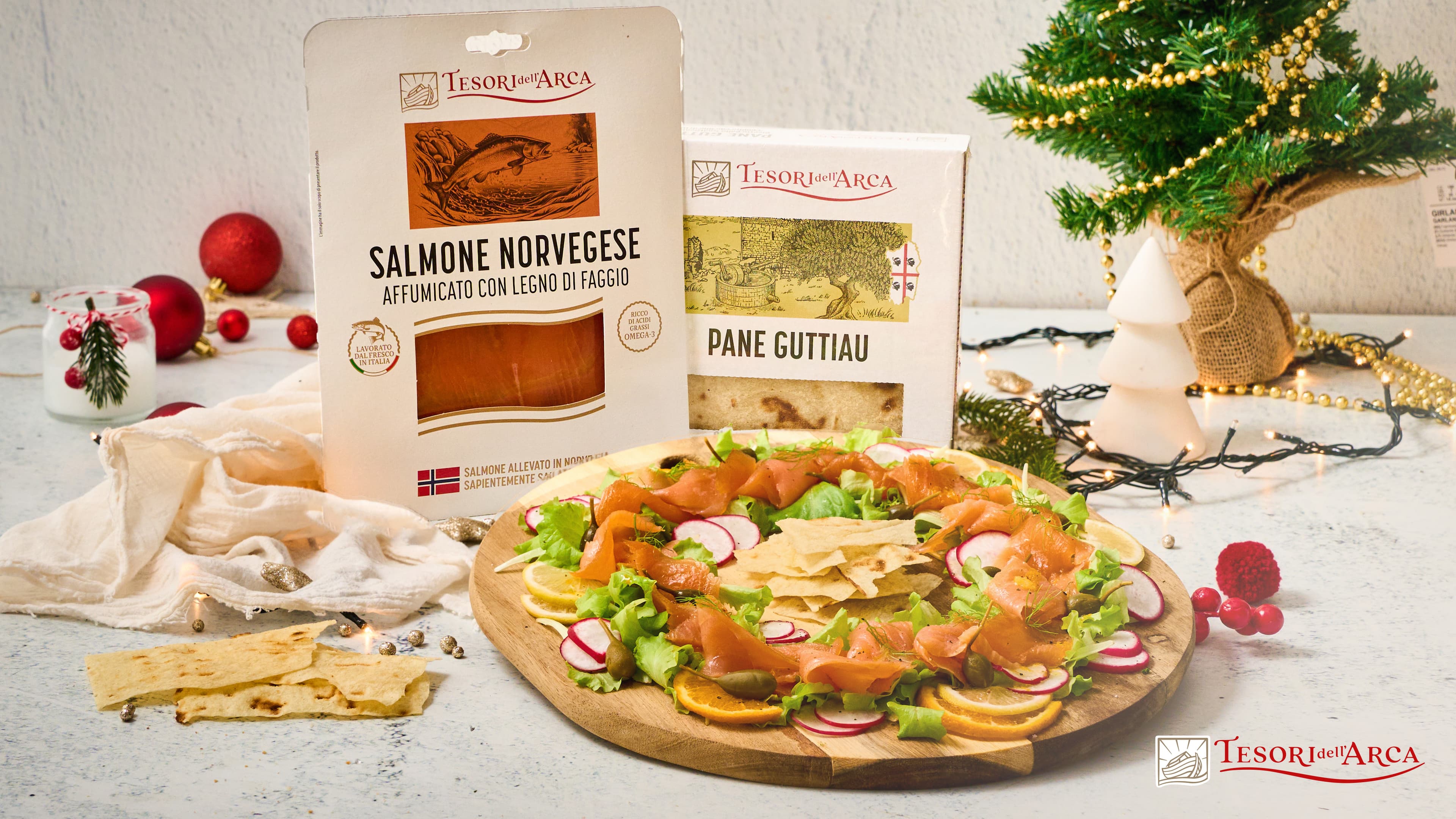 Ghirlanda di salmone norvegese, dressing agli agrumi e pane guttiau