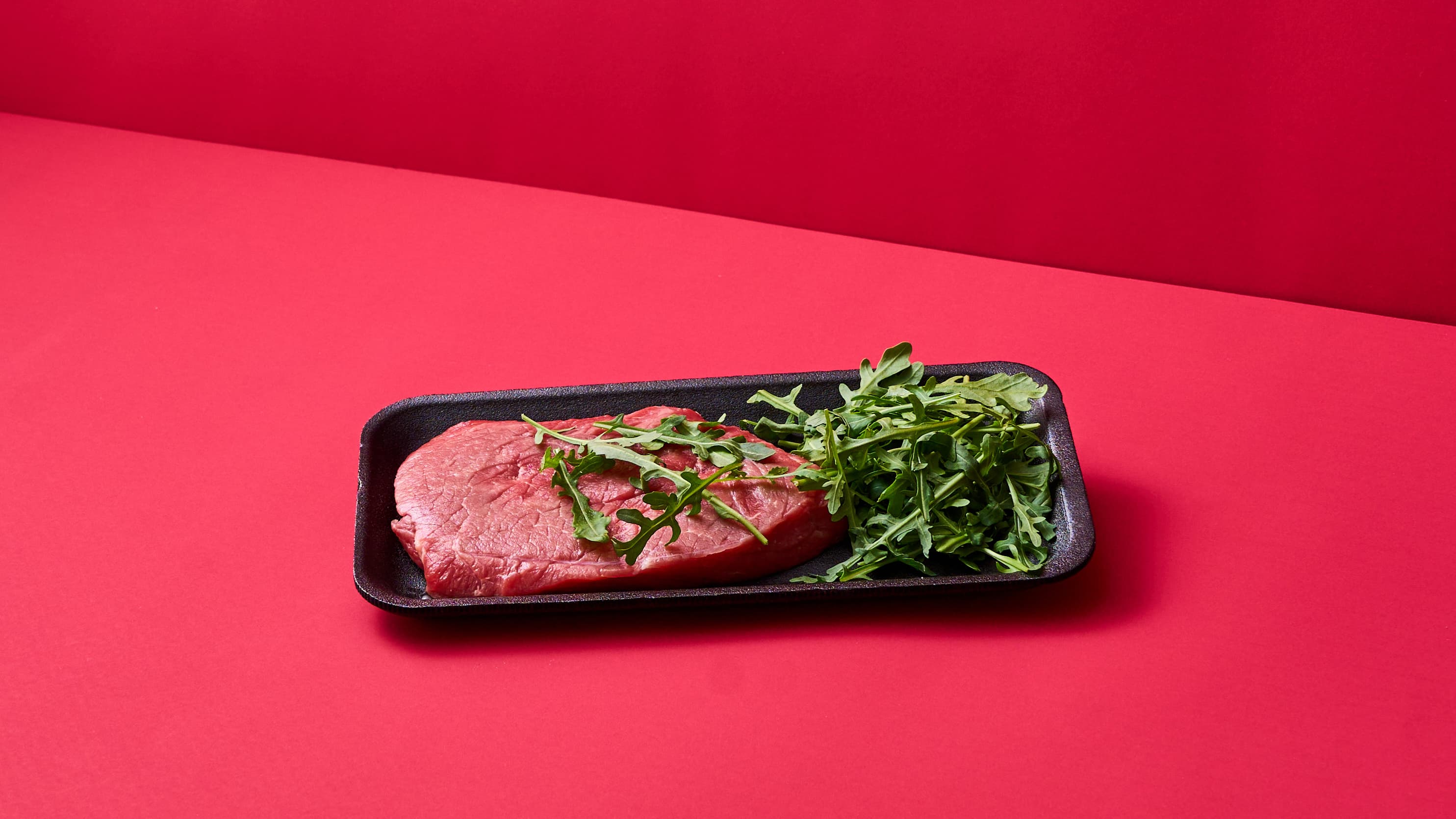 Tagliata di Bovino con rucola e pomodorini confit