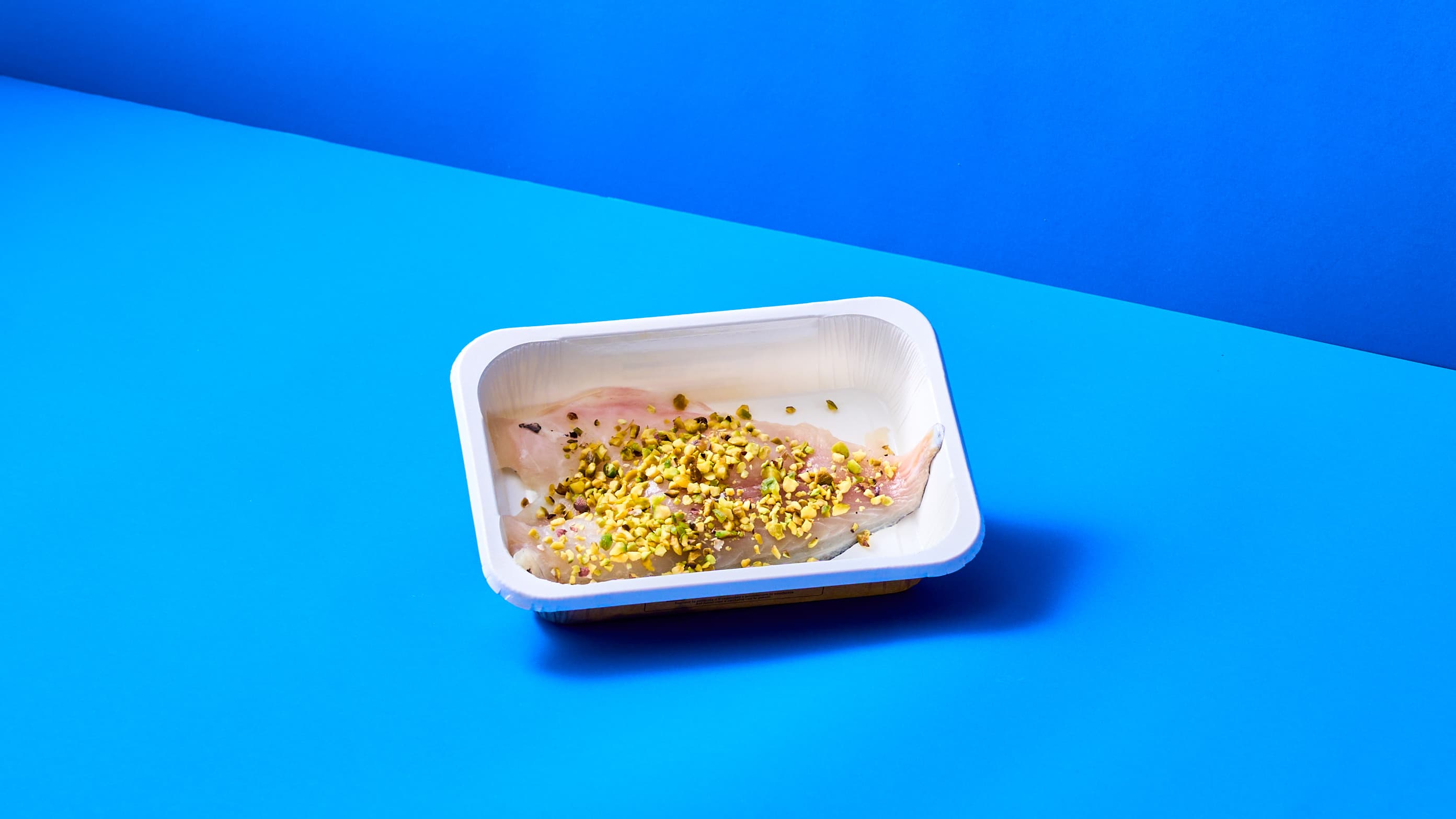 Filetto di Orata al pistacchio con carpaccio di melone lime e menta