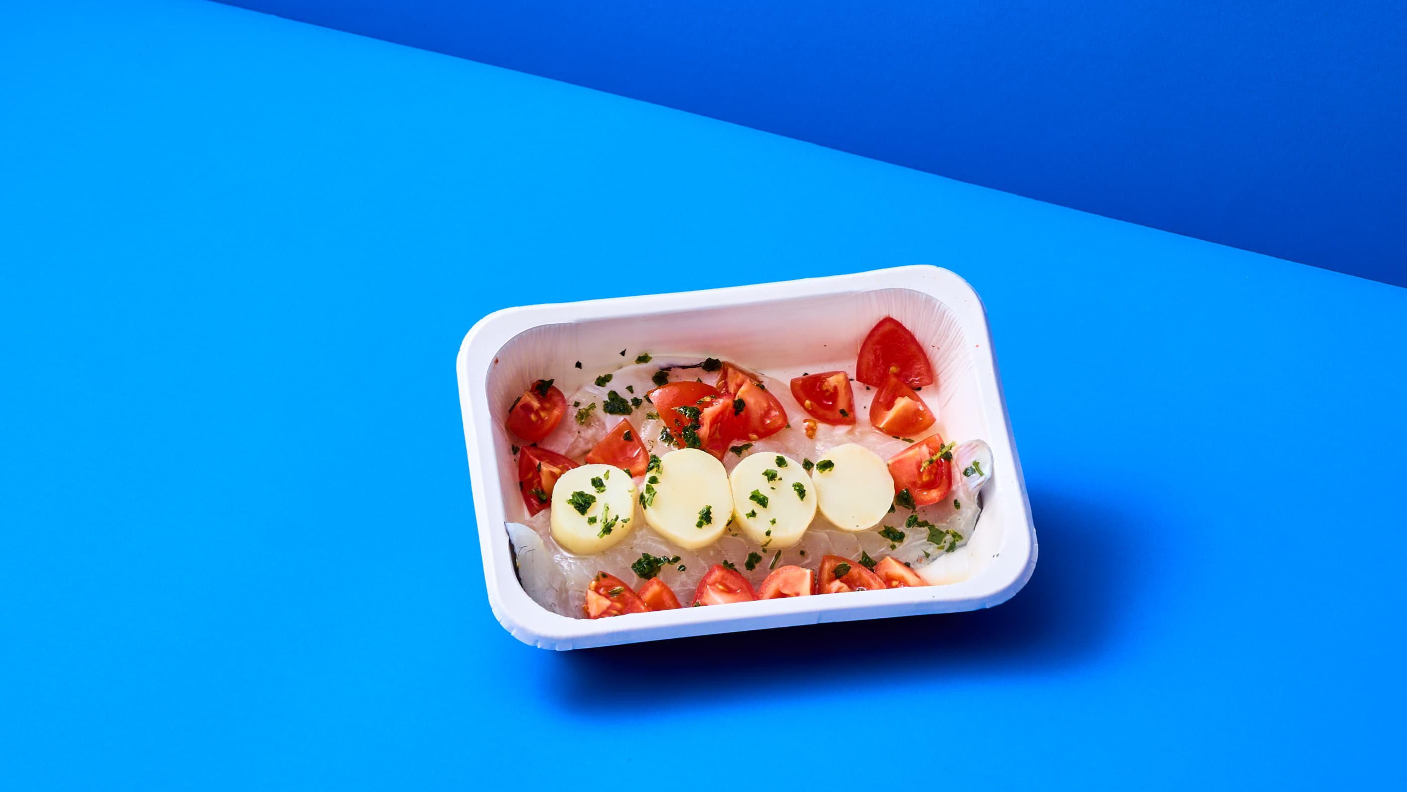 Filetto di Orata con patate e pomodorini con salsa alle erbe