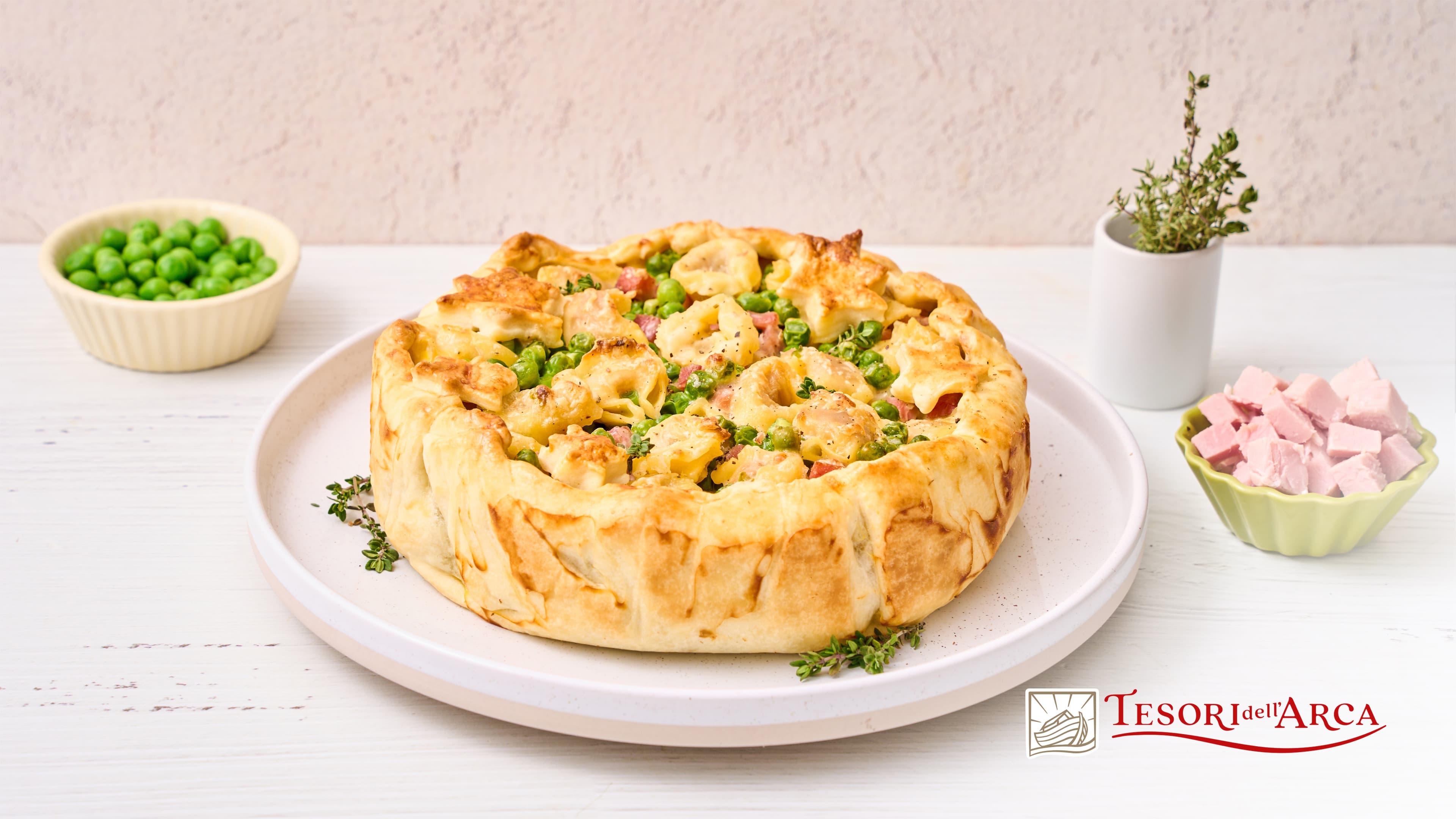 Timballo di tortellini in crosta