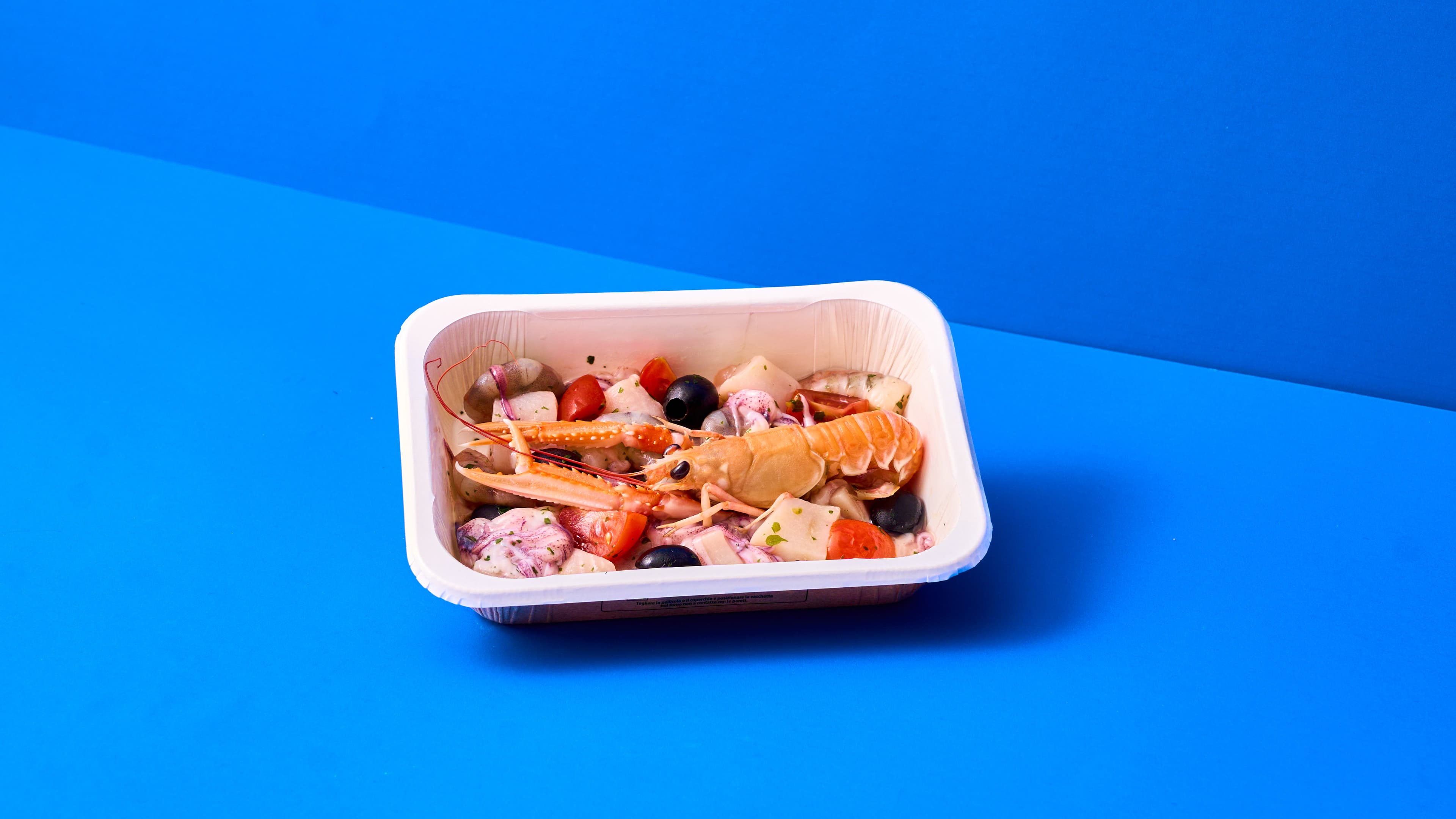 Preparato per sugo allo scoglio con mattonella di polenta alla griglia