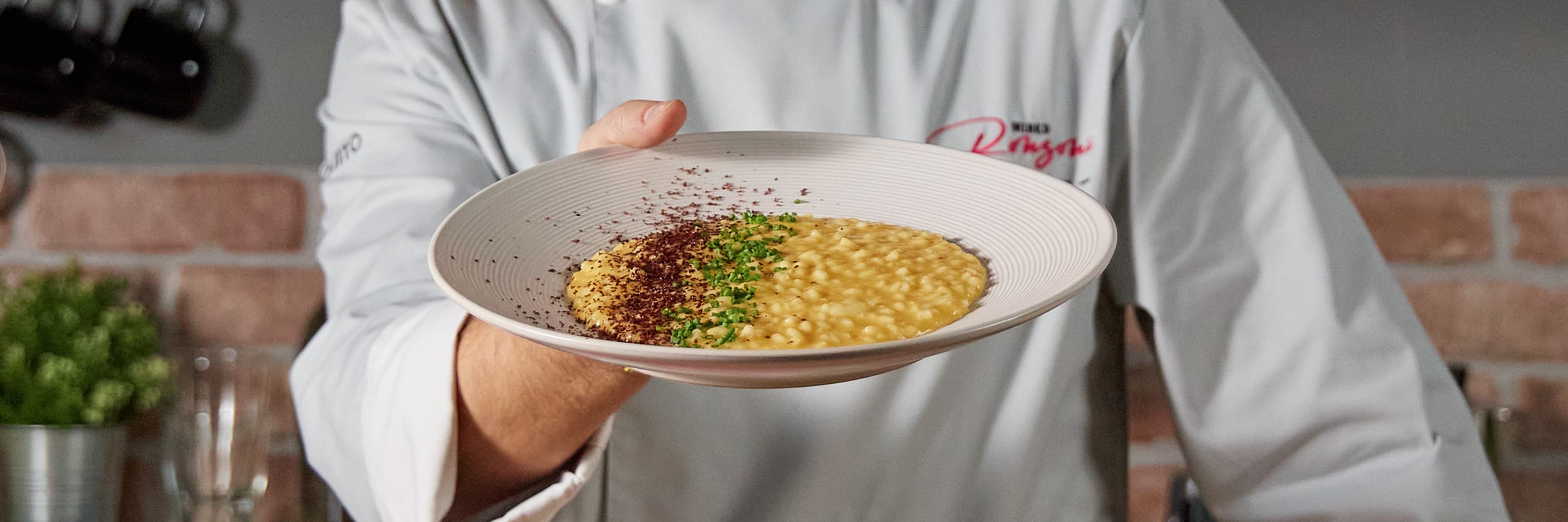 Risotto di zucca con cioccolato fondente 99% ed erba cipollina