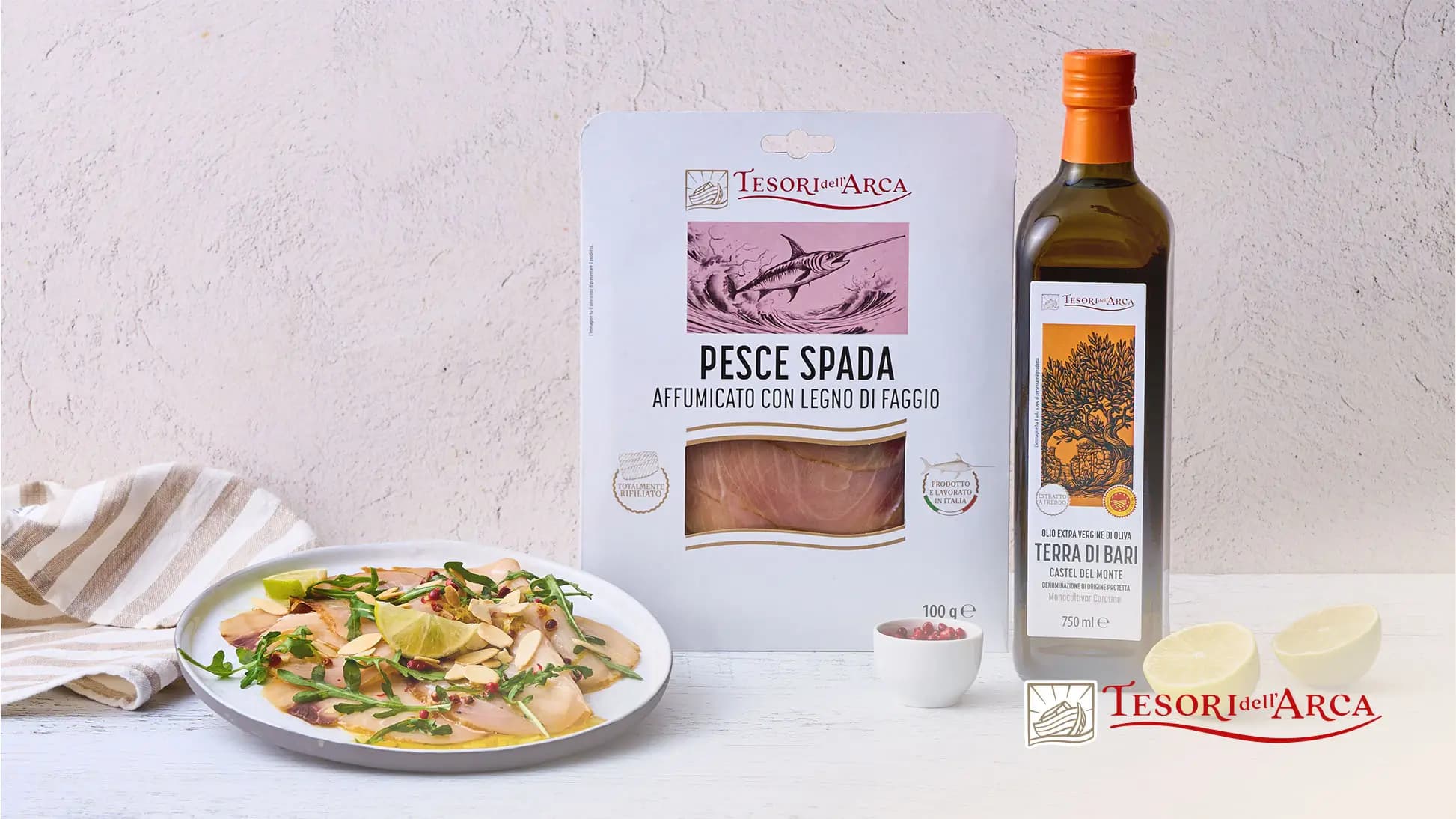Carpaccio di pesce spada e rucola con vinaigrette al lime e pepe rosa