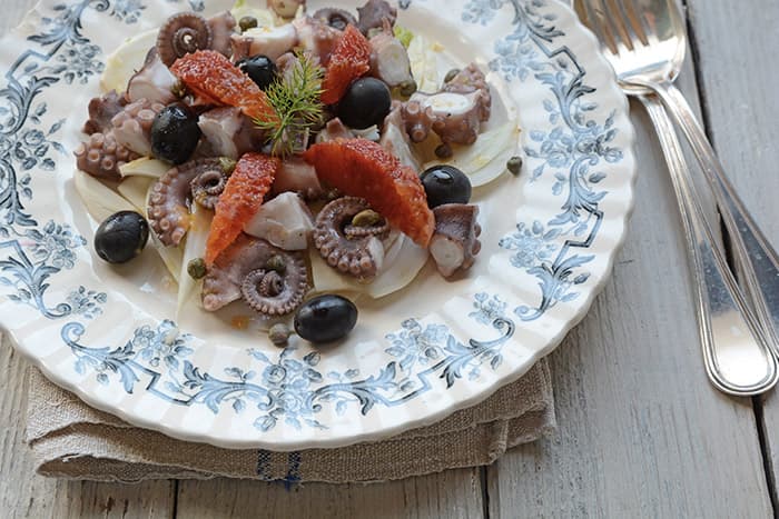 Insalata di polpo con finocchi, olive e citronette all'arancia