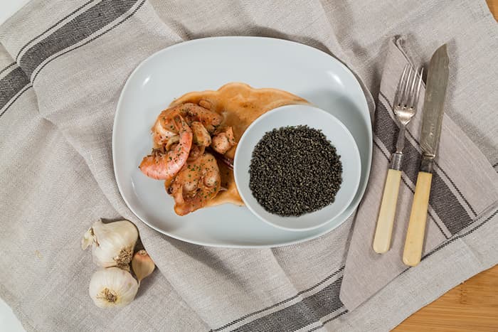 Zuppa di pesce con cous cous al nero di seppia